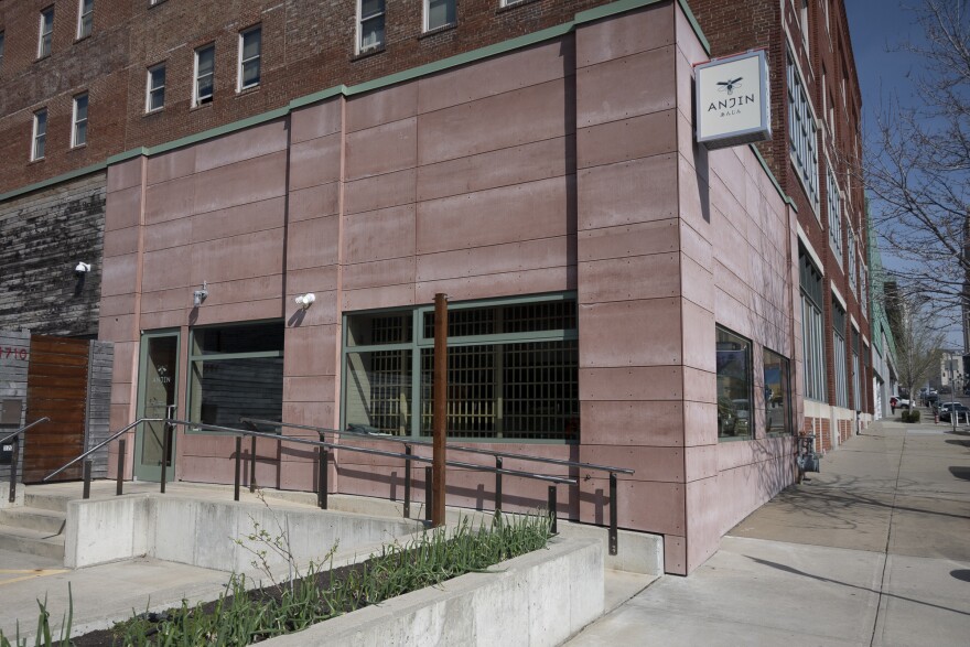 A U-shaped bar anchors Anjin's Crossroads dining room, at 1708 Oak St., which also features an open kitchen.
