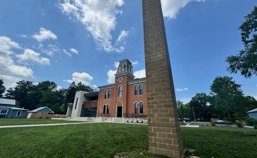 The original chimney housed a colony of chimney swifts and removing it for the renovation displaced them. Rather than lose the colony, WYSO built a dedicated swift tower, seen in the center of the photo. Staff played recorded swift calls at dusk to attract them to the new tower and it worked on the second season. A single swift eats over 1,000 insects per day, and the colony is a meaningful contribution to the local ecosystem.