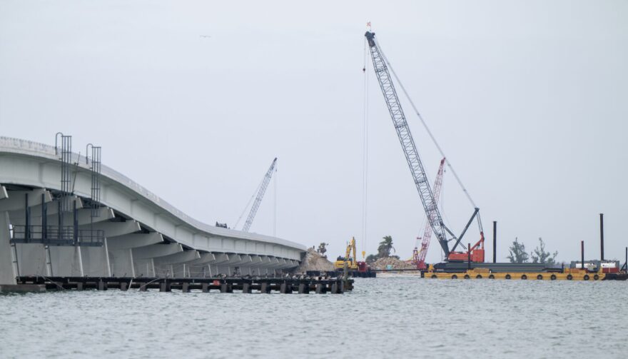 Cranes and construction work on the Sanibel causeway.