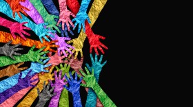 Inclusion and membership and Belonging concept as a symbol of acceptance and integration with diversity and support of different cultures as diverse races and unity symbol holding hands together.