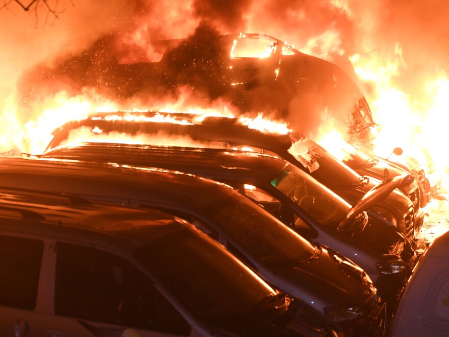 Vehicles burn in Sokcho, South Korea, part of the damage from the worst wildfires the country has seen in years.