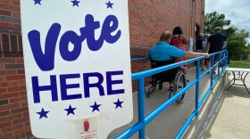 Voters cue up outside the gym at Chapel Lakes Elementary School to vote in primary elections in August. Candidates in Missouri's down-ballot races are concerned voters aren't paying enough attention to those contests with the presidential election garnering so much interest.