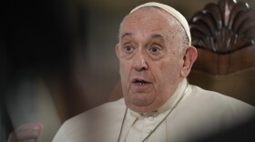 Pope Francis speaks during an interview with The Associated Press at The Vatican, Tuesday, Jan. 24, 2023. According to the pope, the arms industry has brought untold death and destruction to the world. “The world is obsessed with weapons,” he said. (AP Photo/Andrew Medichini)