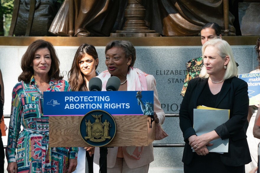 Governor Kathy Hochul announced Monday a push to affirm New York State's abortion rights protections, in response to a recently enacted abortion ban in Texas. With Hochul watching at left, State Assembly Majority Leader Andrew Stewart-Cousins is seen speaking a Monday gathering in New York, where Senator Kirsten Gillibrand (right) also joined the announcement.