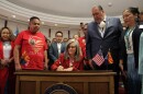 Arizona Gov. Katie Hobbs signs the Turquoise Alert legislation into law on May 21, 2025.