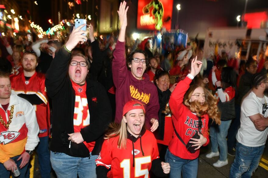  Kansas Citians cheer as the Chiefs make a touchdown in the fourth quarter of the Super Bowl on Feb. 12, bringing the score to 35-27. 