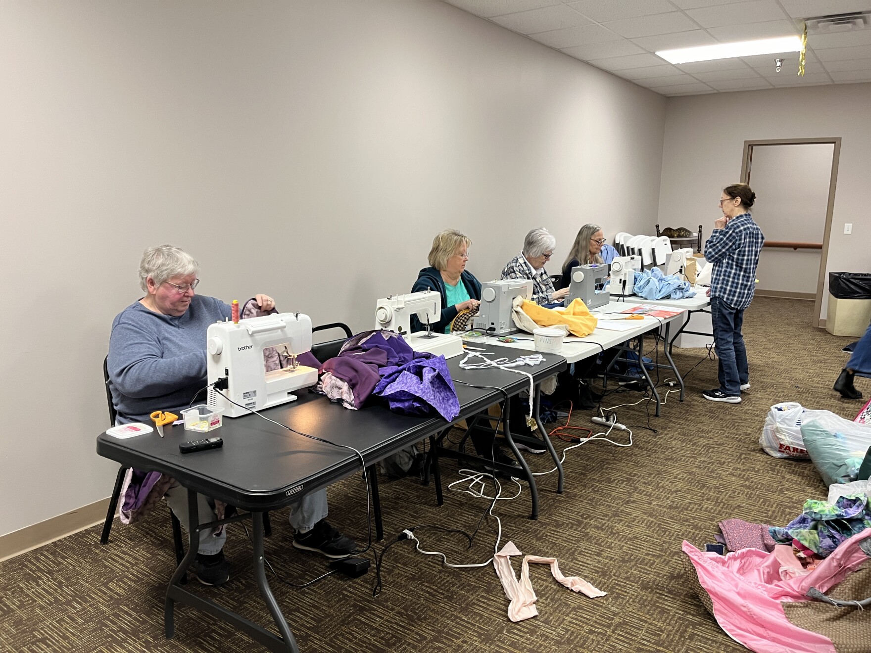 SPM News Extra Volunteers bring needle knowhow and good humor to a