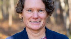 a portrait of a woman outside