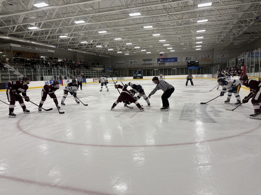 Face-off during the Beloit men's game against Augsburg University