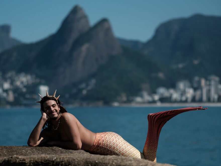 Davi de Oliveira Moreira, known as "<em>Sereio</em>" (merman in Portuguese), poses in costume at Arpoador Rock on Ipanema Beach in Rio de Janeiro, Brazil, last May.