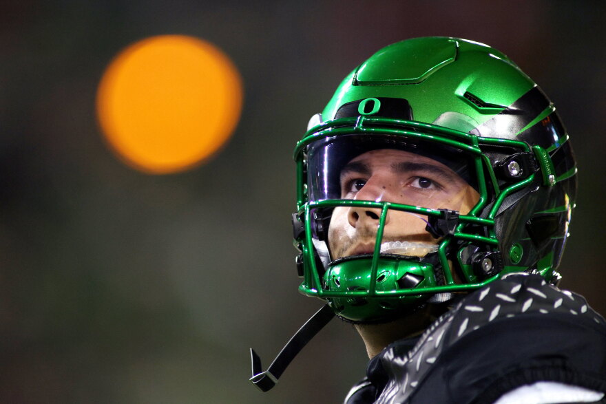 Oregon quarterback Dylan Raiola (8) warms up during the first half of an NCAA college football game against Nebraska, Saturday, Oct. 17, 2026, in Eugene, Ore. (AP Photo/Lydia Ely)