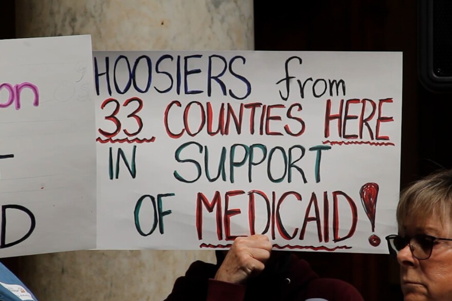 A sign protesting changes to Medicaid
