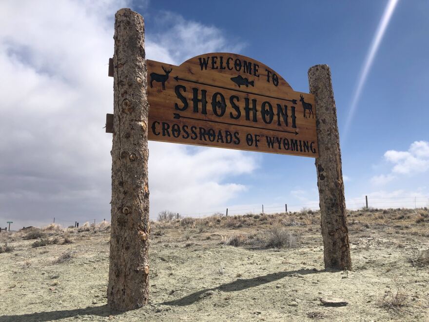 Shoshoni town sign as spring storm rolls in. April 2022.