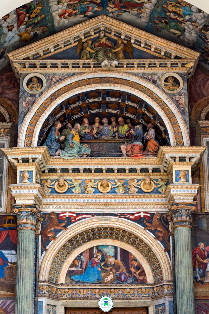 Finding goiter among the painted characters in the gorgeous exterior portal of the Aosta Cathedral in Aosta, Italy, isn't easy. Hint: Check the Nativity scene.