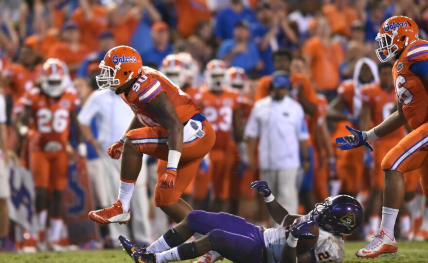 Florida defensive lineman Jonathan Bullard (90) hypes himself up after taking down East Carolina running back Chris Hairston (22).