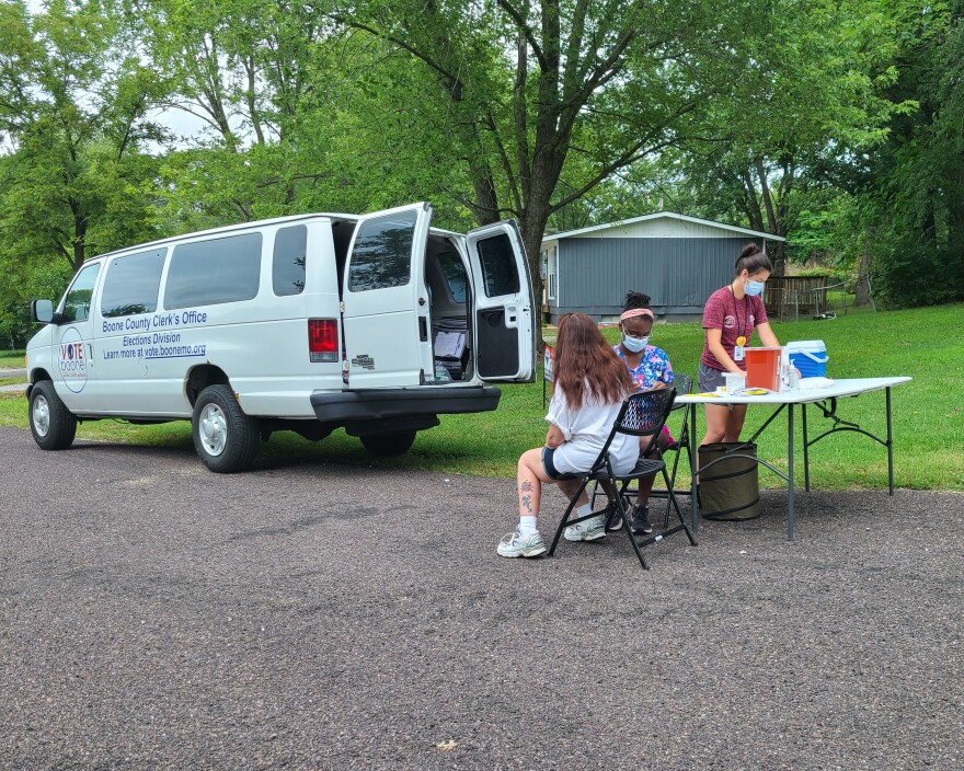 Nurse Kennedi Barker works alongside Ebony Kimmens, a nursing student, to deliver vaccinations to folks in the more rural parts of Boone County that often have lower vaccination rates.