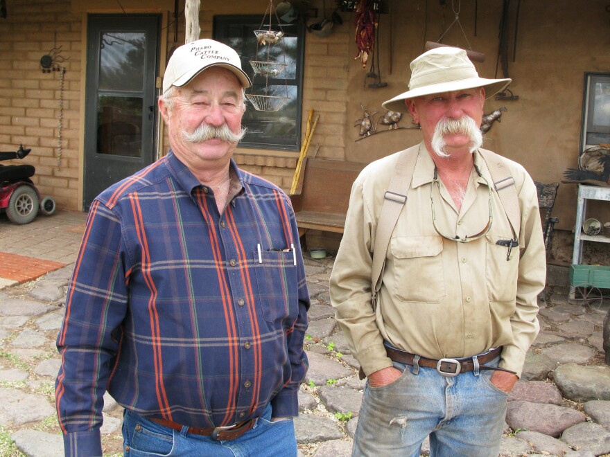 Albert Miller (left) and his brother Bill run cattle on their ranches 10 miles from the Rio Grande and they think the harsh terrain acts as a better deterrent than a manmade barrier ever would.