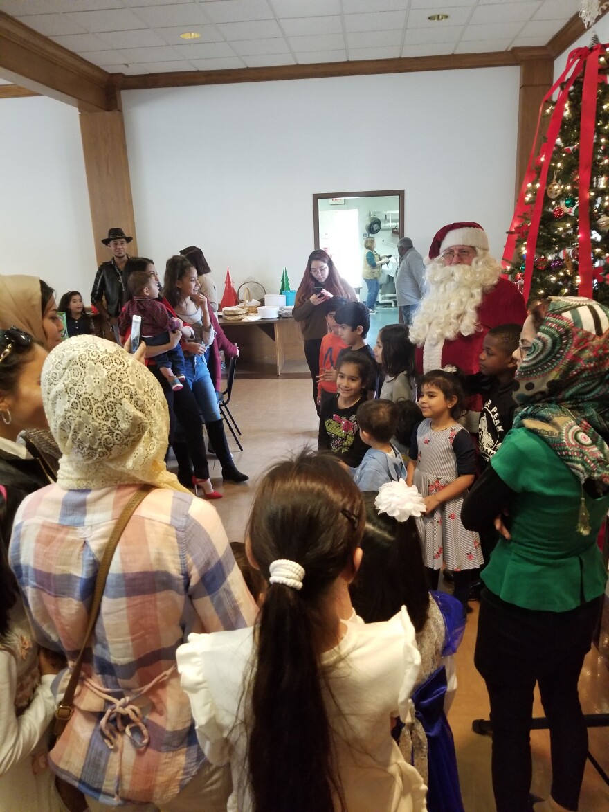 Refugees who are new to North Texas get the chance to meet Santa and open Christmas gifts -- some for the first time -- at the annual Refugee Family Christmas Party hosted by Gateway of Grace.