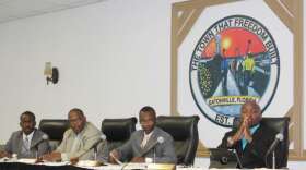 (L to R: Councilman Theo Washington; Councilman Eddie Cole; Mayor Anthony Grant; Councilman Rodney Daniels at the Eatonville Town Council Meeting.) Photo: Renata Sago.