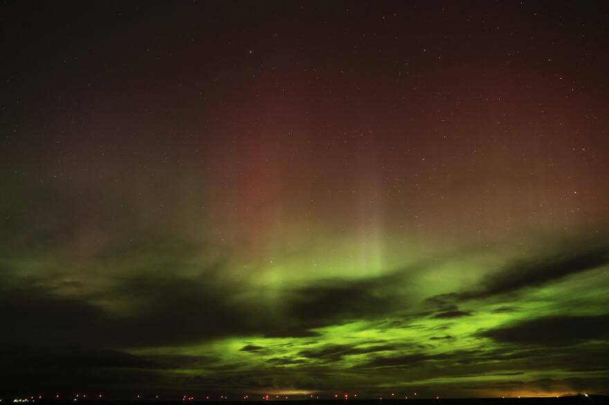 An aurora borealis, also known as the northern lights, is seen in the sky in the early morning hours of April 24, near Washtucna, Wash. An intense solar storm has the aurora borealis gracing the skies farther south than usual.