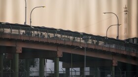 Pedestrians cross the international bridge that connects Ciudad Juarez, Mexico, and El Paso. 