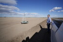 FILE - Tom Brundy looks over his field that is being prepared for planting near Calexico, Calif., Feb. 28, 2023.