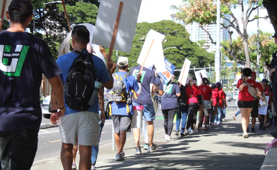 Kaiser Permanente workers represented by the Unite Here! Local 5 and other groups strike in Honolulu on Oct. 14, 2025.