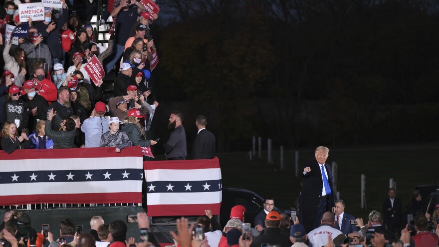 Then-President Donald Trump waves to supporters during a campaign rally on Oct. 24, 2020, in Circleville, Ohio.