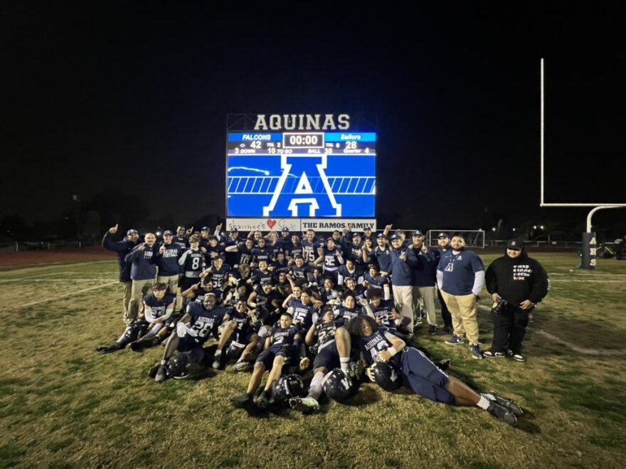 The Aquinas football team after beating Newport Harbor 42-28 on Dec. 3.