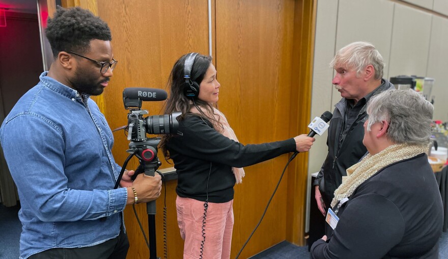 From left: Hernz Laguerre Jr. and Emiko Moore record interviews at Dayton’s Sinclair College Tenant Fair.