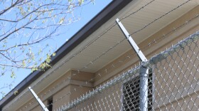  The barbed wire fence outside of the Geary County Secure Care facility 