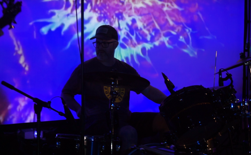 Rishi Maze performing live in WNIJ's Studio A