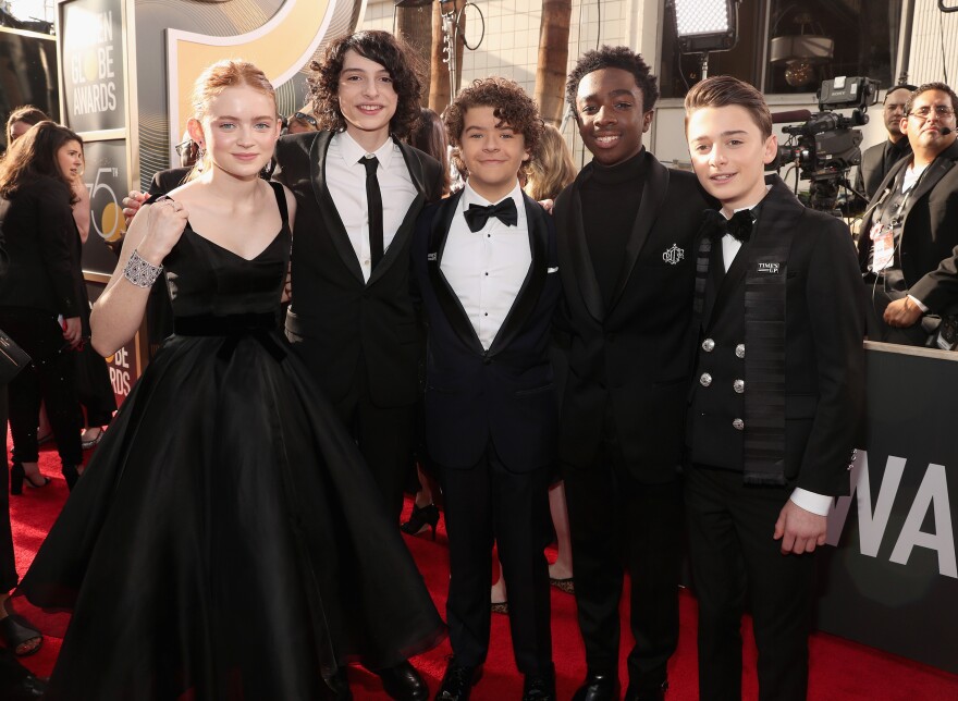 (From left to right) Actors Sadie Sink, Finn Wolfhard, Gaten Matarazzo, Caleb McLaughlin and Noah Schnapp arrive to the 75th Annual Golden Globe Awards held at the Beverly Hilton Hotel on January 7, 2018.