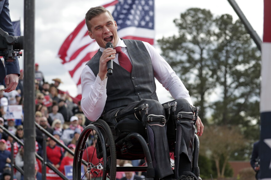 FILE - Rep. Madison Cawthorn, R-N.C., speaks before former President Donald Trump takes the stage at a rally on April 9, 2022, in Selma, N.C. A series of unforced political and personal errors by Cawthorn has brought the forces of big-name Republicans and traditional enemies to bear on his reelection bid in North Carolina.