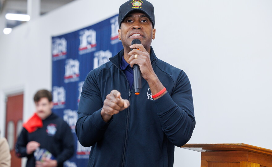 Republican nominee for governor John James speaks to volunteers in Lansing Township, Mich., on Oct. 24, 2026, during a stop on Republican U.S. Senate nominee Mike Rogers' "We Have a State to Save" bus tour.