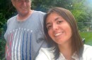 A selfie of two people outside, one a young woman and the other a man. 