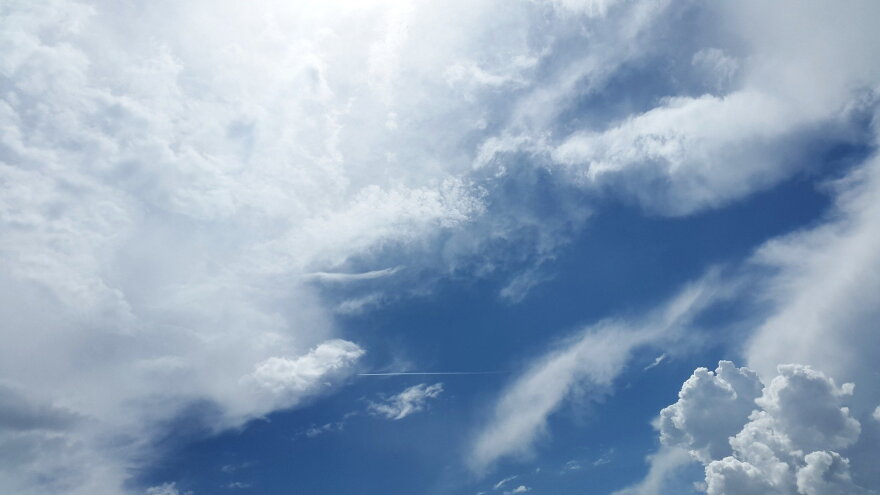 Clouds against a blue sky