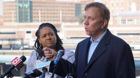 File photo of Gov. Ned Lamont and his budget adviser, Melissa McCaw.
