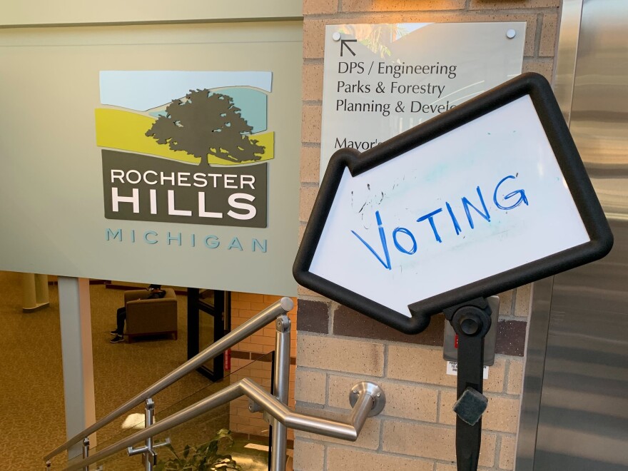 Voting sign and Rochester Hills sign together