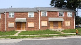 Older housing units across from the Imani Village