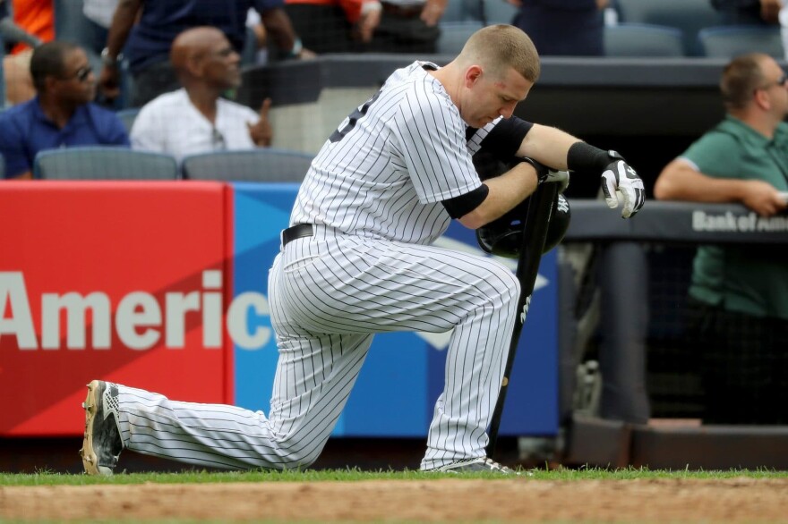 Todd Frazier of the New York Yankees reacts after a child was hit by a foul ball off his bat in the fifth inning against the Minnesota Twins on Sept. 20, 2017 at Yankee Stadium in the Bronx borough of New York City.  (Abbie Parr/Getty Images)