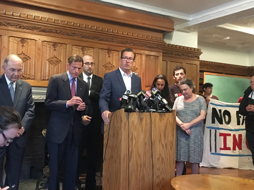 Governor Malloy at Yale Law School during News Conference announcing litigation filed for release and reunification of immigrant children held in Connecticut