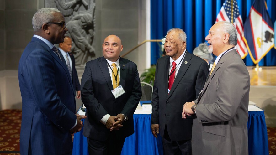 Pictured: From left, Gov. Albert Bryan Jr., of the U.S. Virgin Islands, talks with Lt. Gov. Josh Tenorio of Guam; Gov. David Apatang of the Northern Mariana Islands; and Gov. Pulaali'i Tuiteleleapaga Iuli Nikolao Pula of American Samoa during the senior plenary session of the Interagency Group on Insular Areas at the U.S. Department of the Interior in Washington in September.