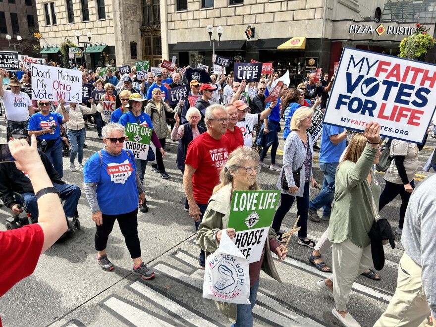 Attendees at the Ohio March for Life walk down High Street in front of the Statehouse on Oct. 6, 2023.