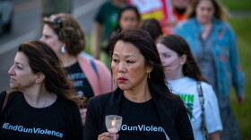 FILE, 2022: Po Murray, Chairman of the Newtown Action Alliance, leads a march to the National Shooting Sports Foundation headquarters during a vigil in Newtown following the school shooting in Uvalde, TX.