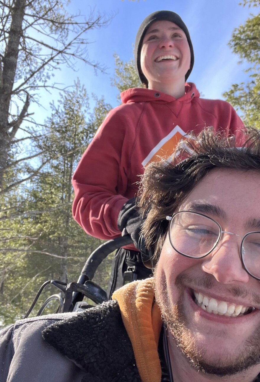 Laura Neese takes reporter Michael Livingston on a dogsled ride during a recent training run. (credit: Michael Livingston / Points North)