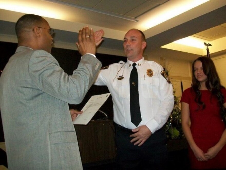 Portsmouth, Ohio, Police Chief Robert Ware (center).