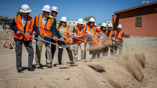 Local leaders shovel dirt during the official groundbreaking for the Casitas del Camino affordable housing project in Northwest Albuquerque