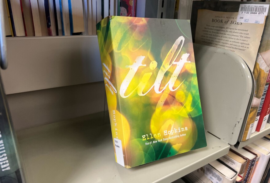 “Tilt” by Ellen Hopkins is one of 18 books banned statewide in Utah schools. But in a guidance change, students are once again allowed to bring their personal copies of these books to campus. July 28, 2025.