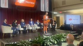 Dr. Kayse Shrum introduces the workforce development panel after announcing the OSU Polytech project.